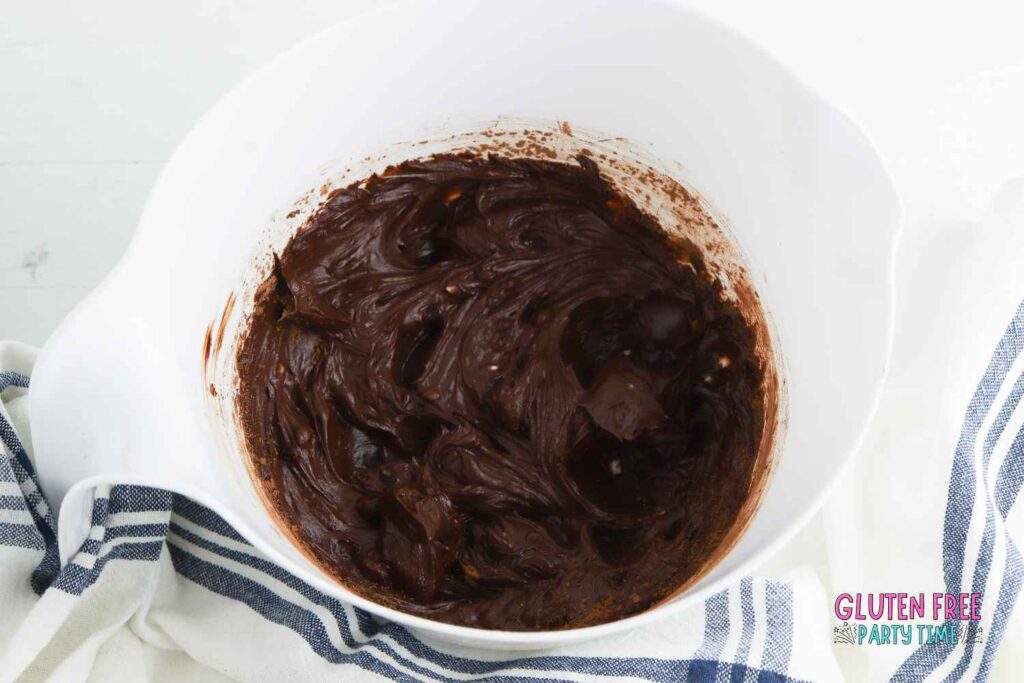beat cocoa powder and butter for icing
